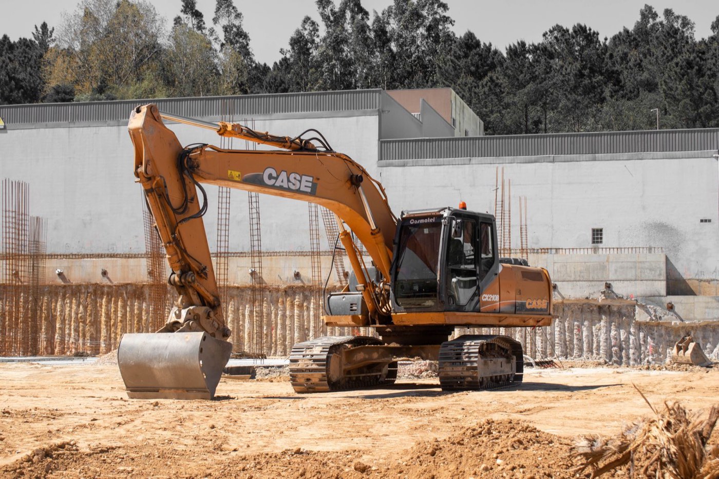 Excavator finishing the pit for the foundation